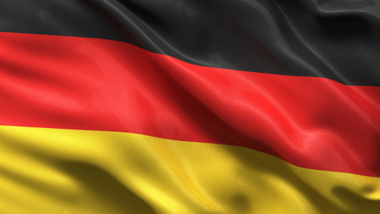 Silky flag of Germany waving in the wind with highly detailed fabric texture